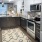 a kitchen with a stove and oven