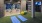 a room with exercise equipment and exercise mats