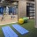 a room with exercise equipment and exercise mats