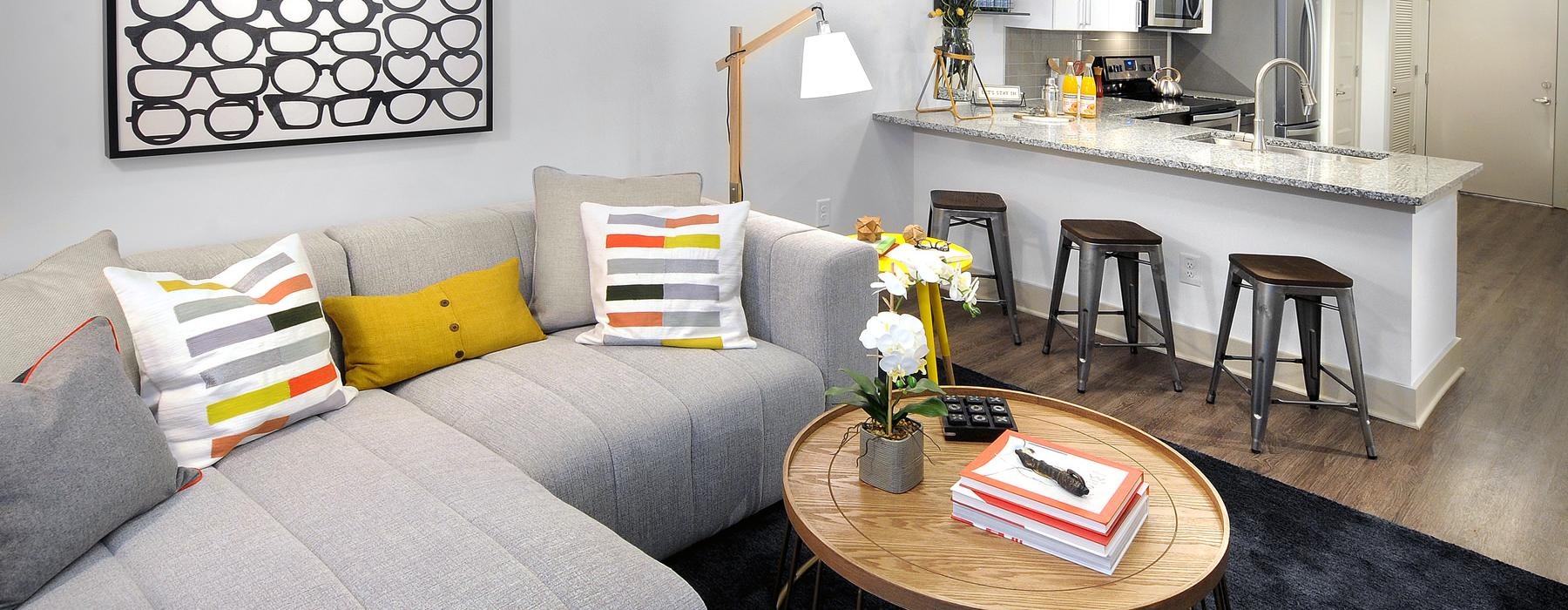 a living room with a couch and a table