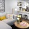 a living room with a couch and a table